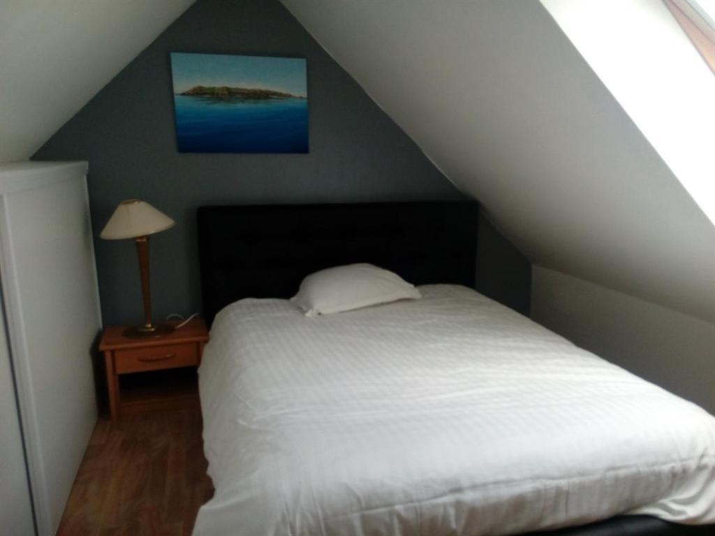 La maison du Lenn face à la mer Louannec Camera foto